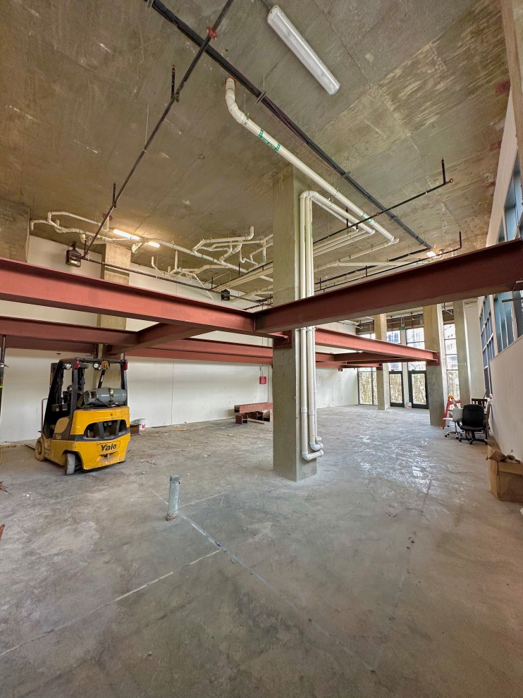 Rising to New Heights ️ Steel beams forming the backbone of our mezzanine projec